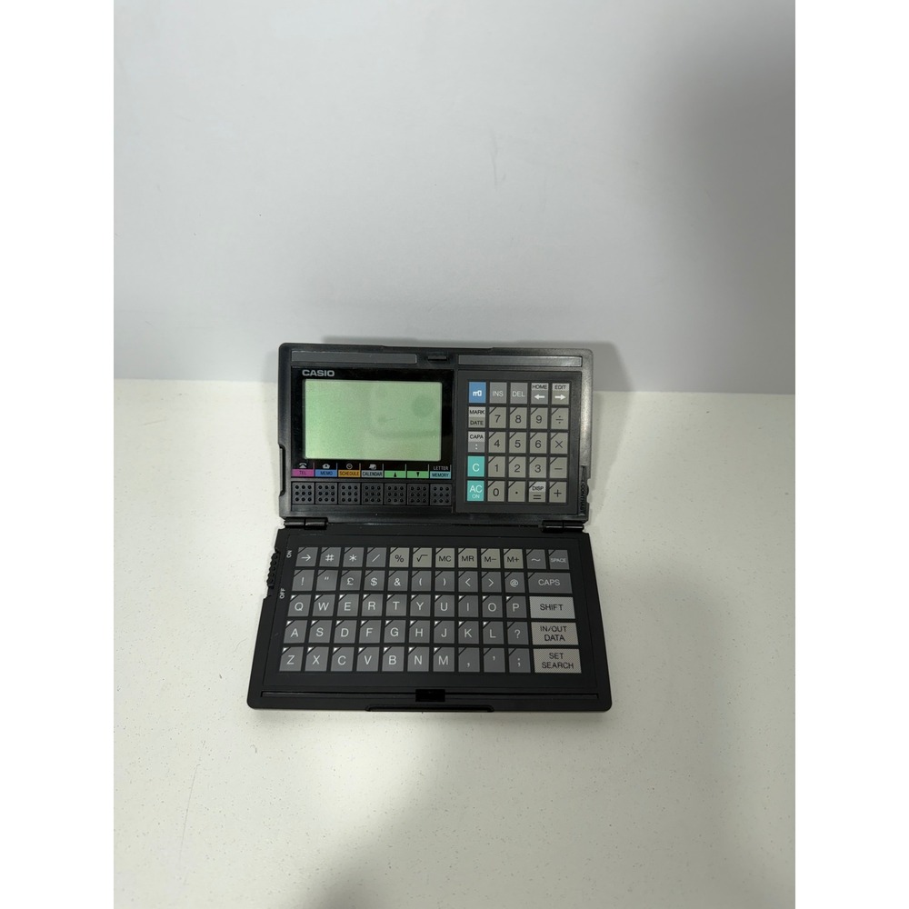 Casio Digital Diary SF-4000 Vintage Handheld Organizer Black Made in Japan PDA